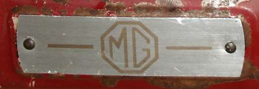 MG logo plate