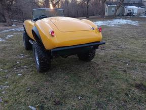 Jeep chassis with MGA body